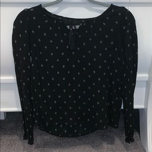 Black long sleeve shirt with white diamond pattern